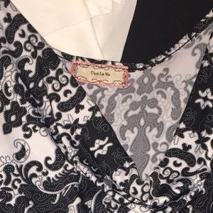 Women’s sleeveless blouse with cowl neck